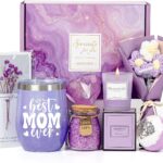 A purple gift box with a 12 oz. "Best Mom Ever" tumbler, knitted flower, heart soap, bath bomb, bath salt, and candle.
