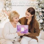 A purple gift box with a 12 oz. "Best Mom Ever" tumbler, knitted flower, heart soap, bath bomb, bath salt, and candle.