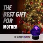 Heart-shaped 3D lamp with a child running to a mother, glowing with multicolor LED light on a dark background.