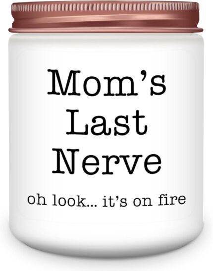 A pink and white round Homsolver 'Mom's Last Nerve' lavender-scented soy candle in a jar, with a lit wick.