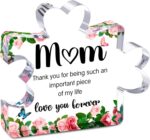 Transparent acrylic puzzle piece with "Mom" and a loving message, ideal for tabletop display.