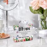 Transparent acrylic puzzle piece with "Mom" and a loving message, ideal for tabletop display.
