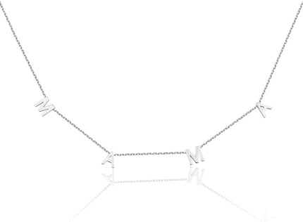 Close-up of a 14K gold plated 'Mama' pendant necklace on a delicate cable chain, with a glossy finish.