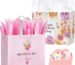 Two large pink floral gift bags with handles, tissue paper, greeting cards, and stickers for Mother's Day gifts.