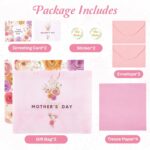 Two large pink floral gift bags with handles, tissue paper, greeting cards, and stickers for Mother's Day gifts.