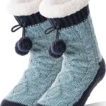 Pair of Welwoos women's fuzzy thermal fleece slipper socks in Balls-blue with non-slip grips on a wooden floor.