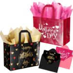 Two ysmile Mother's Day gift bags, one pink with hearts and one black with gold details, with tissue paper and cards.