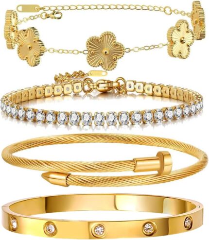 Four Zesnoy 18K gold-plated stackable clover bangle bracelets on a white background, showcasing their shine.